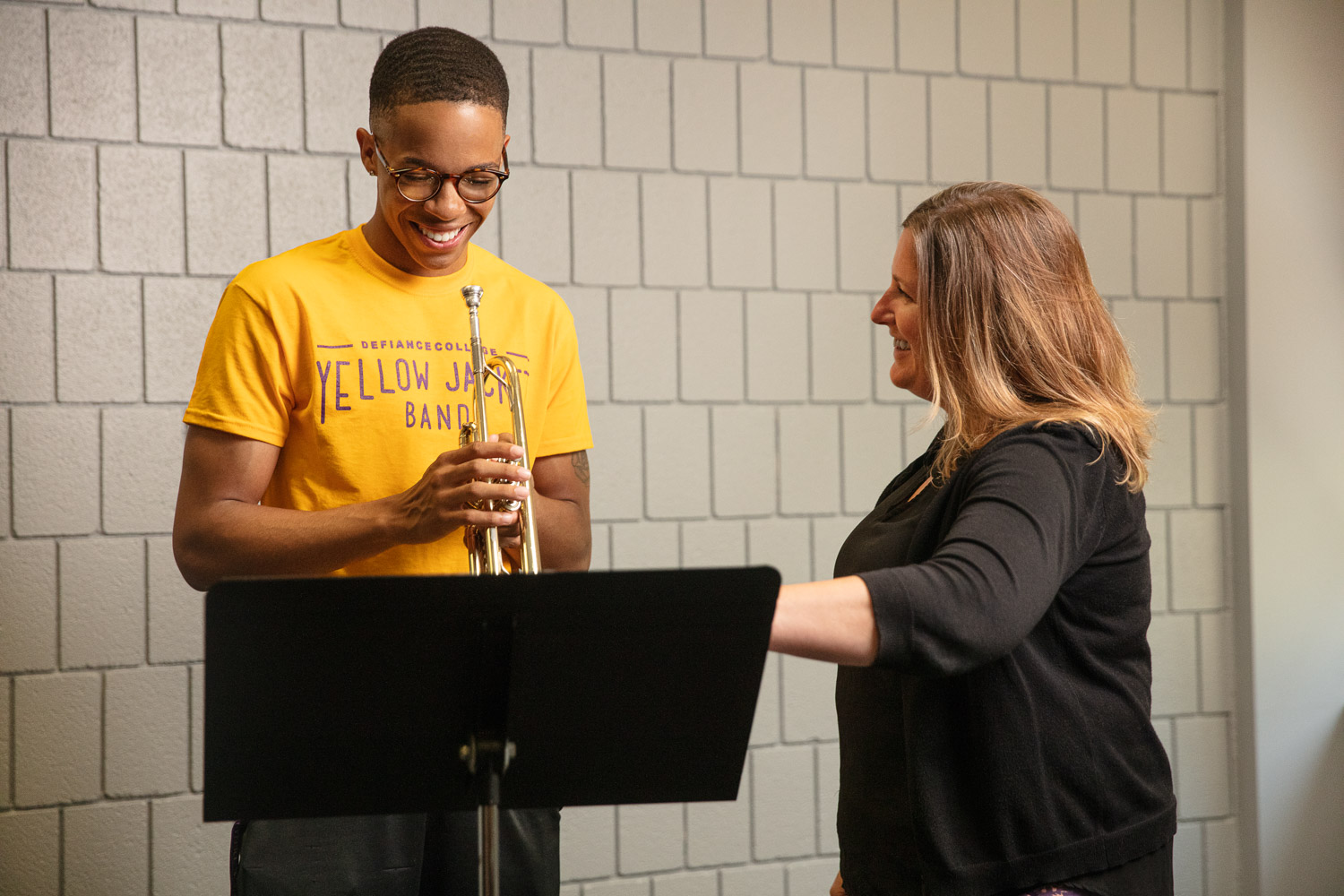 Defiance College student playing the trumpet